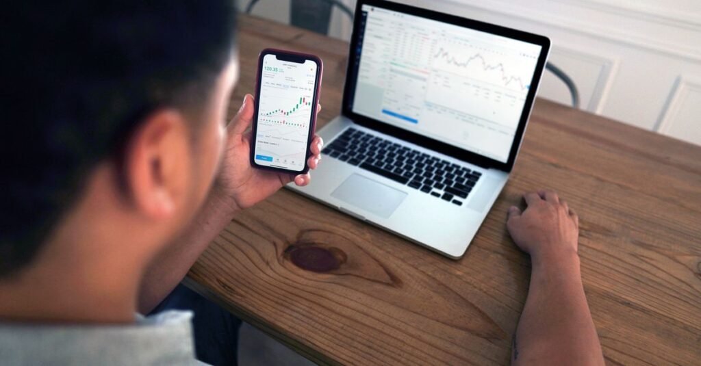 Trader reviewing stock options on a digital tablet screen