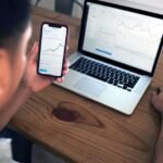 Trader reviewing stock options on a digital tablet screen