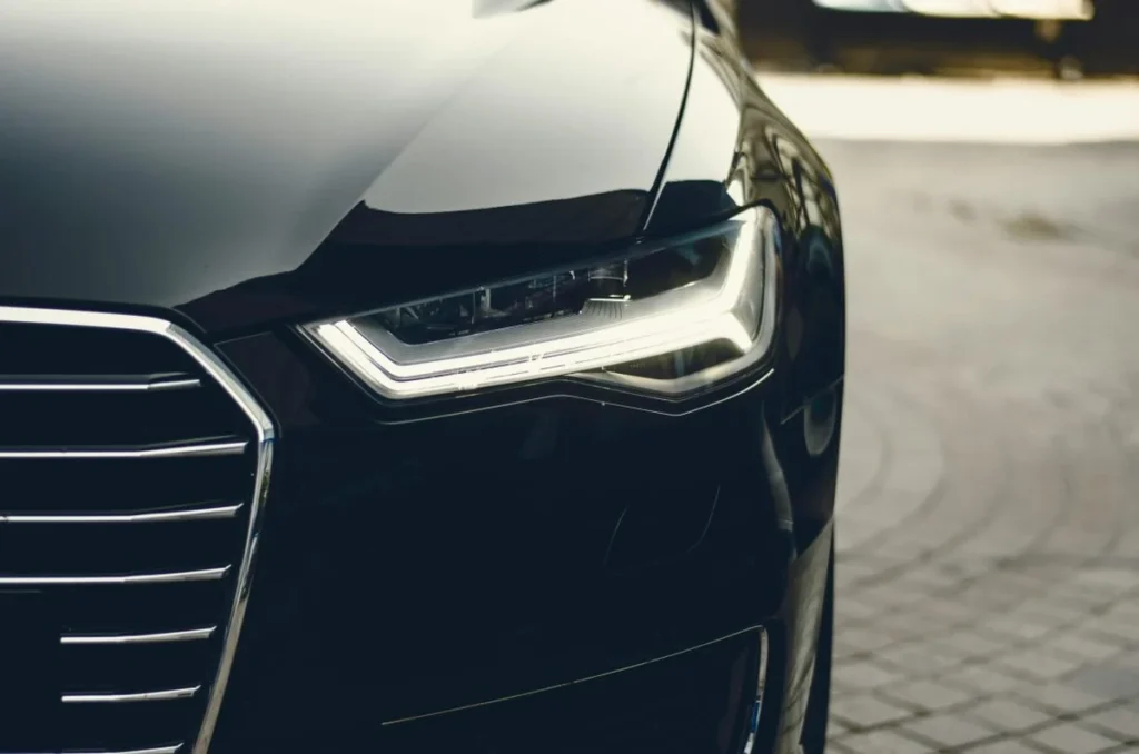 Millennial driver reviewing car finance documents at home