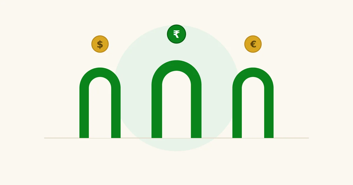 Illustration of rupee, dollar, and euro coins over three figures